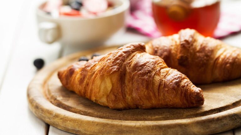010116600_1742806632-tasty-beautiful-croissants-wooden-board-traditional-continental-breakfast-grano.jpeg